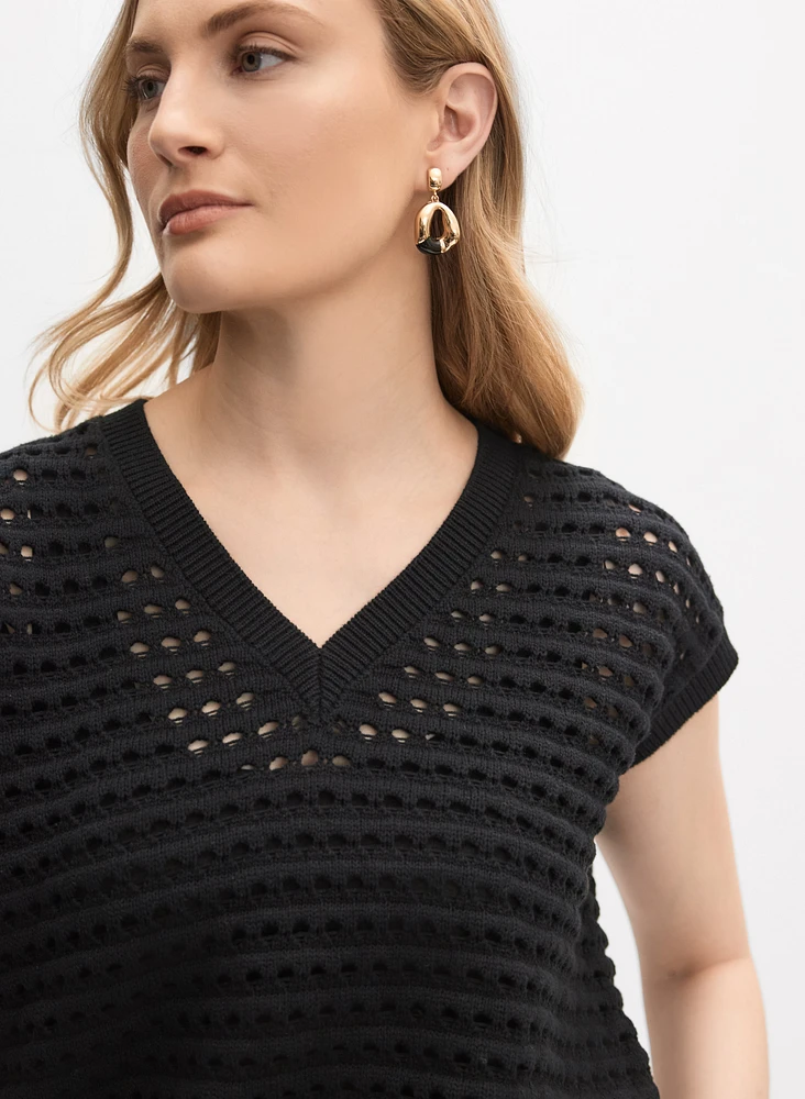 Pull en tricot ajouré