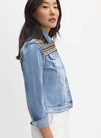 Veste en denim à broderies appliquées