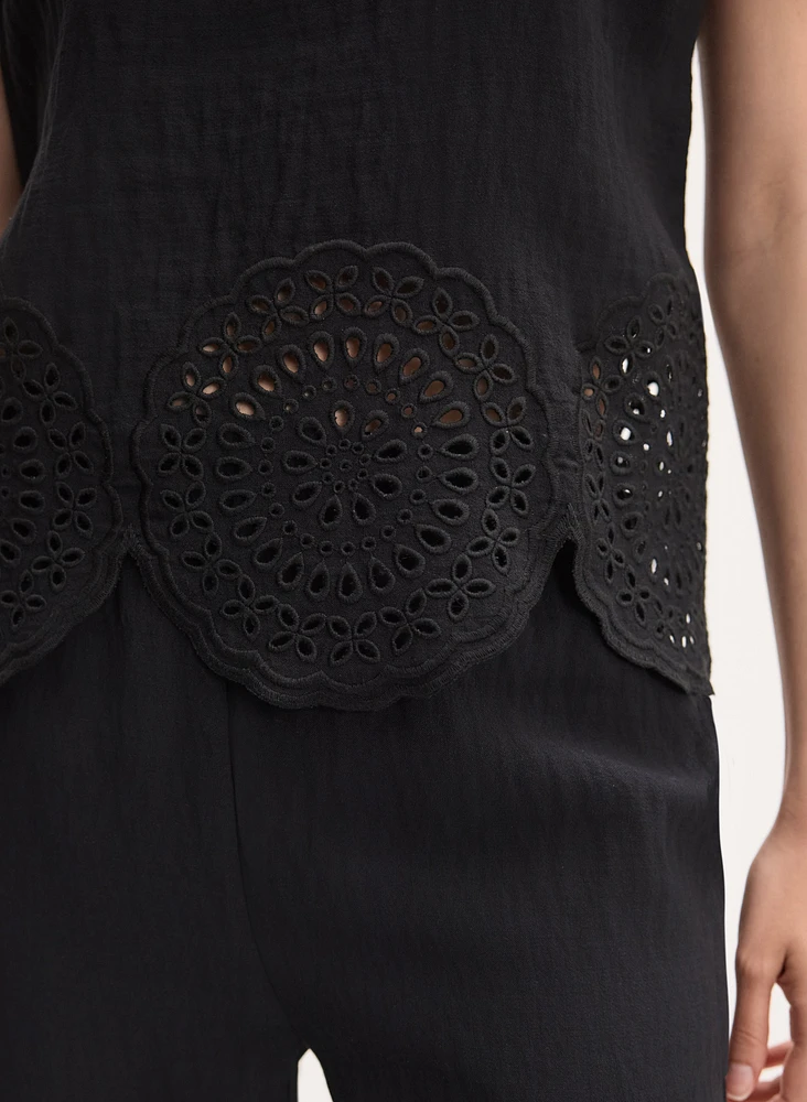 Blouse sans manches à ourlet brodé
