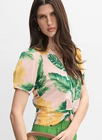 Blouse tropicale à ourlet torsadé