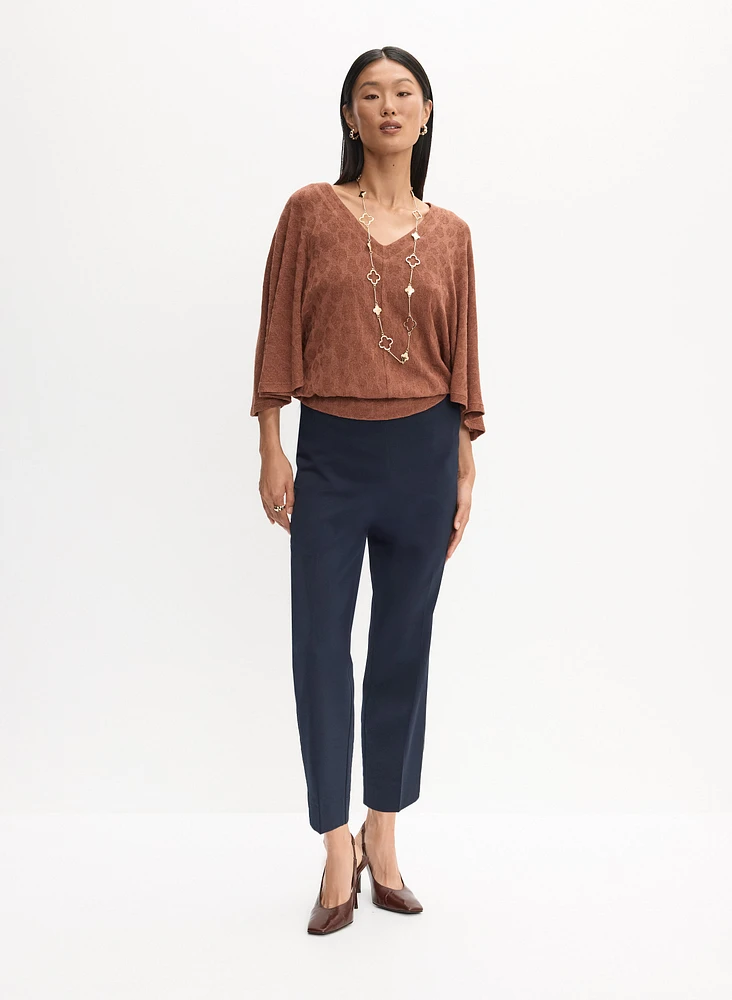 Haut à motif animal et pantalon à jambe droite
