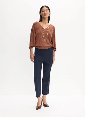 Haut à motif animal et pantalon à jambe droite