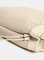 Sac à main perforé à cordon
