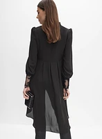 Blouse asymétrique à poignets en dentelle