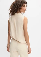 Blouse sans manches à poches en crochet