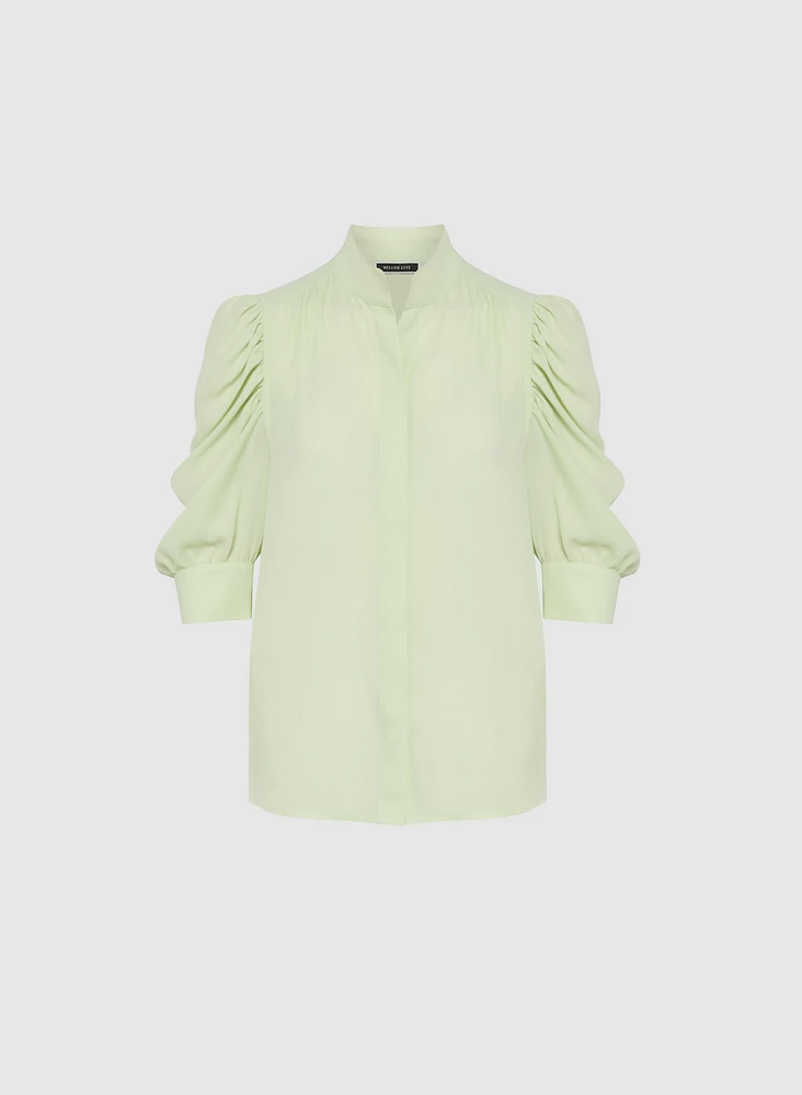 Blouse en crêpe à manches bouffantes