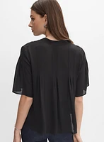 Blouse en crêpe à encolure boutonnée