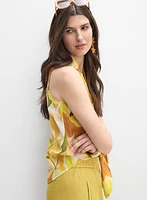 Blouse florale sans manches
