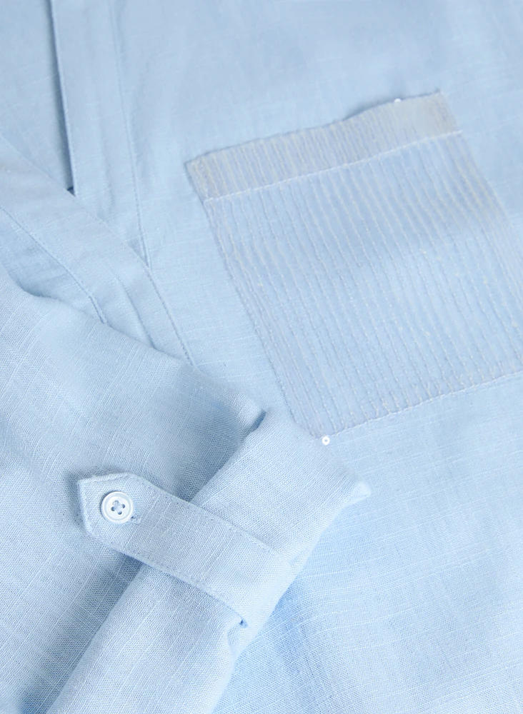 Blouse en lin avec poches à sequins