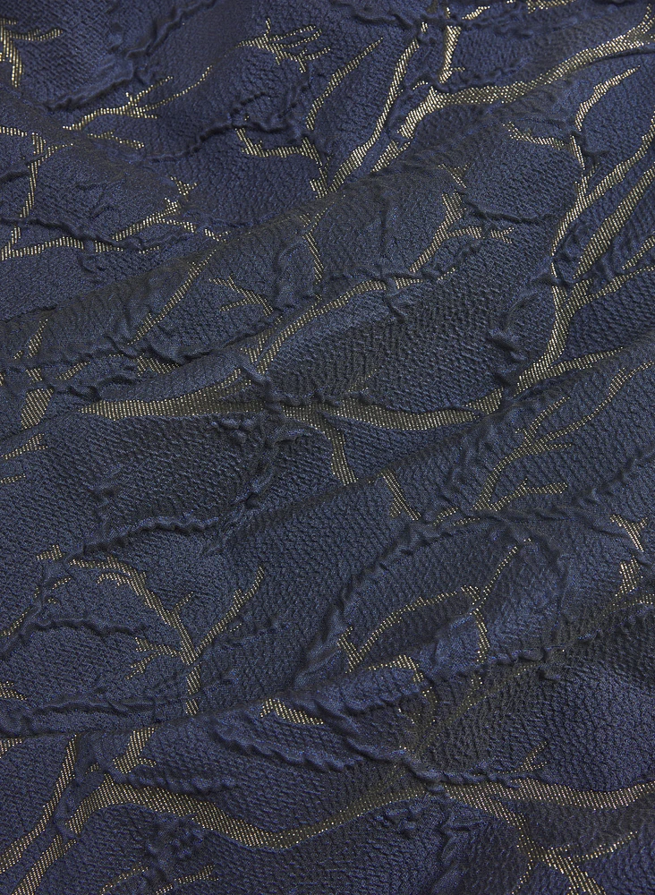 Robe en jacquard à encolure asymétrique