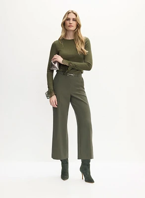 Haut à poignets en dentelle et pantalon gaucho ceinturé