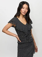 Blouse à pois et volants