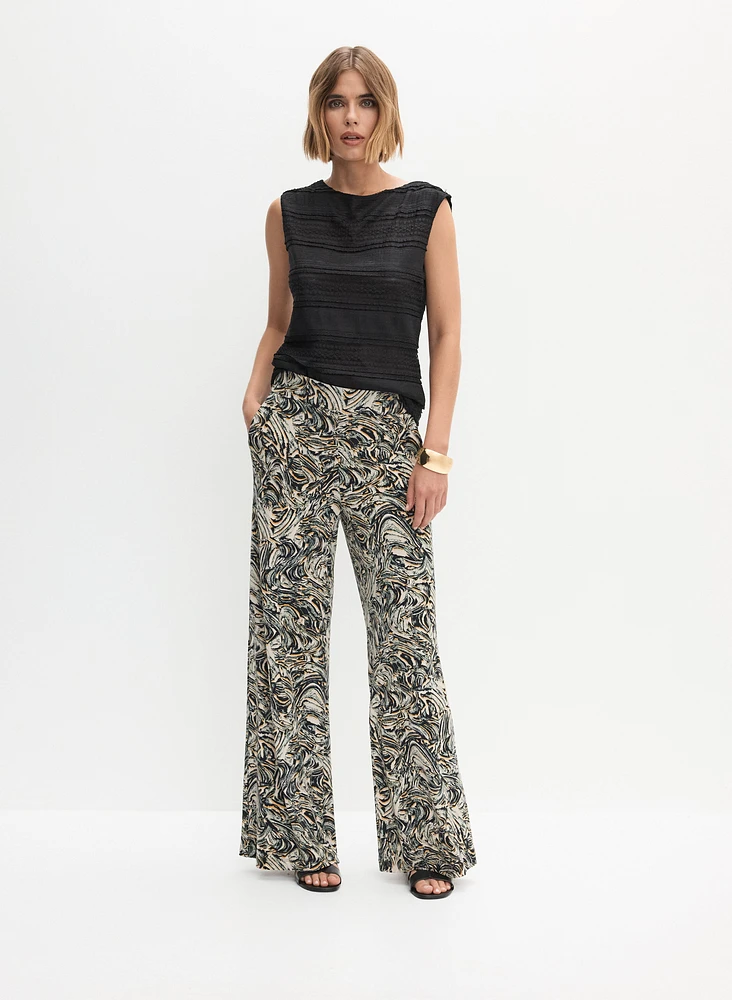 Haut en dentelle et pantalon à motif abstrait