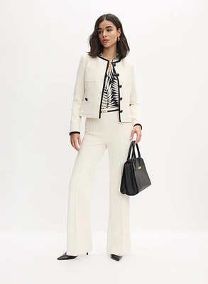 Veste à bordures contrastantes et pantalon à jambe évasée
