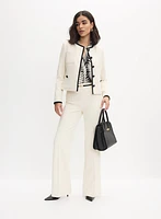 Veste à bordures contrastantes et pantalon à jambe évasée