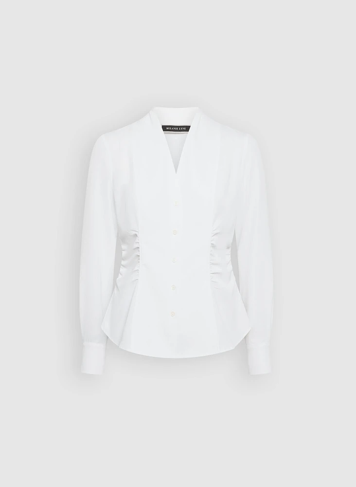 Blouse boutonnée à détails plissés