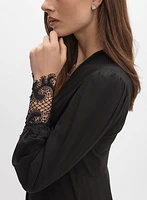 Blouse asymétrique à poignets en dentelle