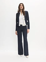 Pantalon à jambe évasée détails contrastants