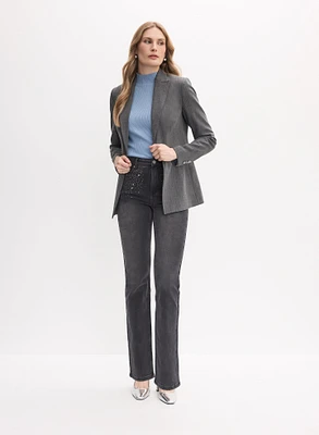 Blazer rayé et jean à jambe droite