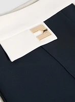 Pantalon à jambe évasée détails contrastants