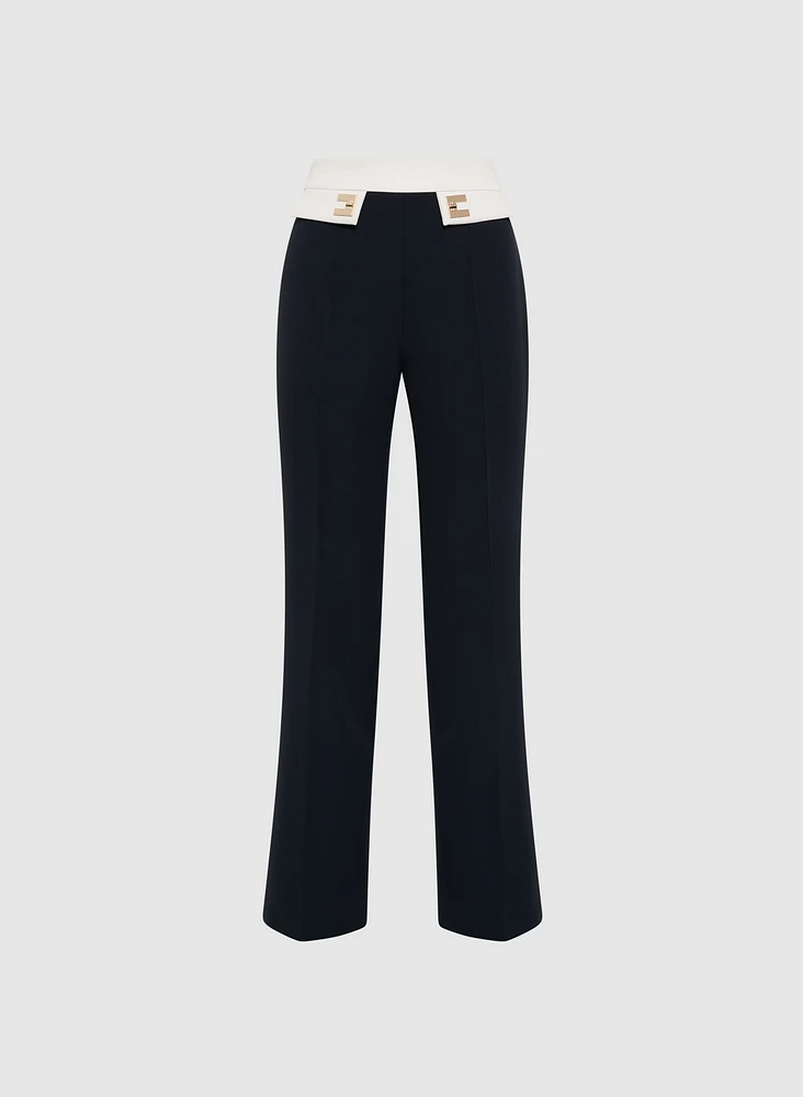 Pantalon à jambe évasée détails contrastants