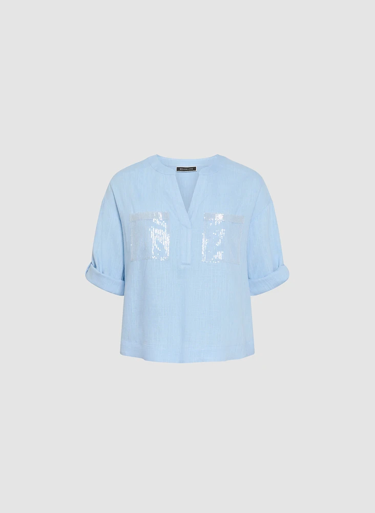 Blouse en lin avec poches à sequins