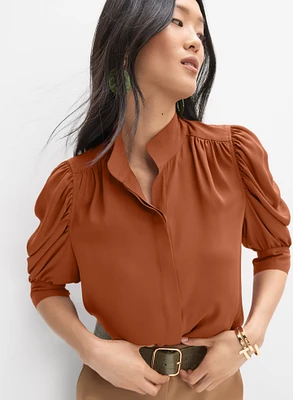 Blouse à manches bouffantes drapées