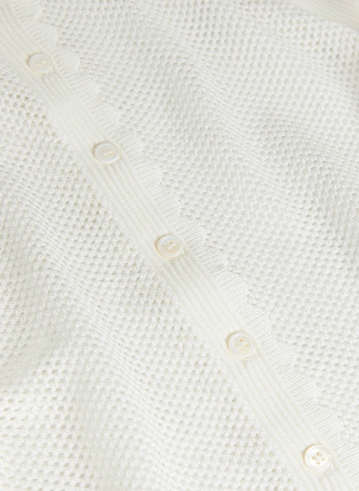 Cardigan à bordures festonnées