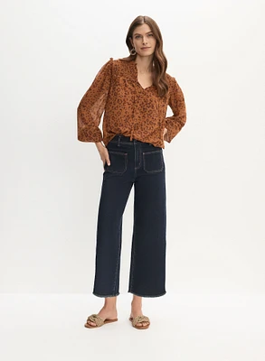 Blouse à motif léopard et jean gaucho