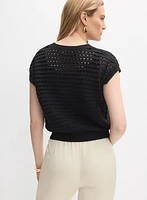 Pull en tricot ajouré