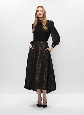 Haut à sequins et jupe asymétrique