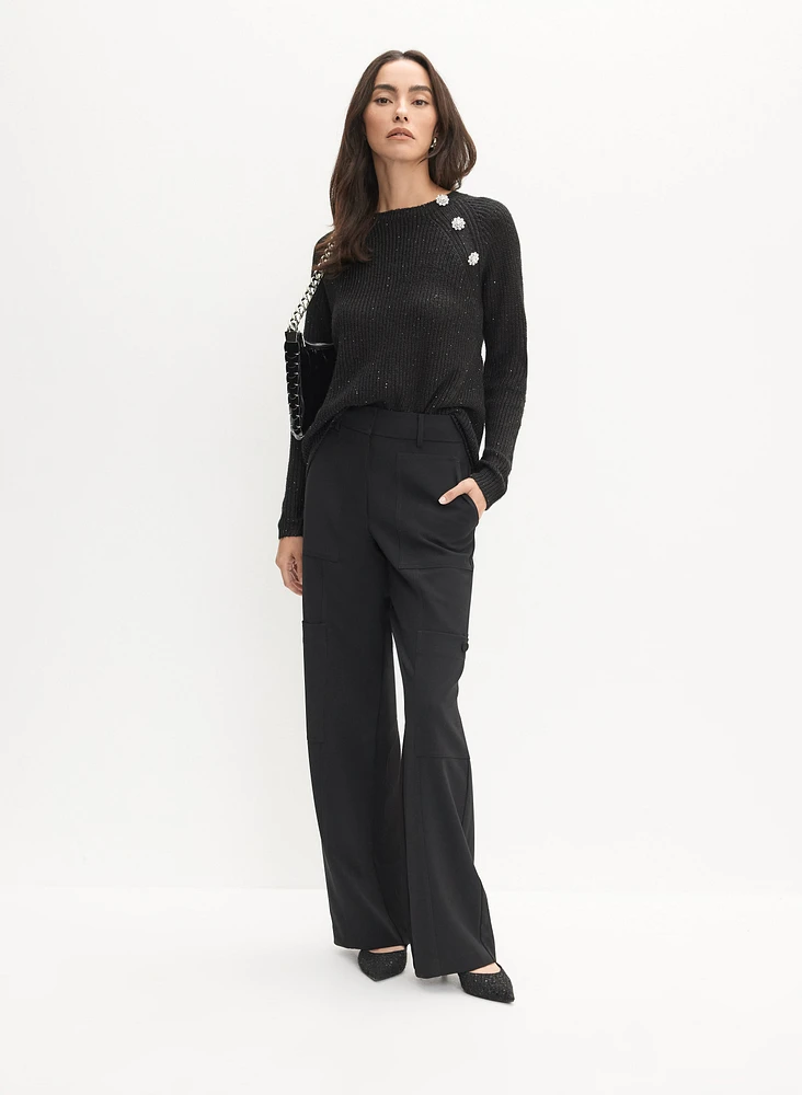 Pull asymétrique à boutons fantaisie
