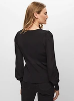 Pull coupe péplum à boucle ouverte