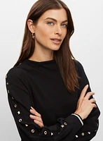 Robe à détails de clous au manches