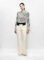 Blouse à pois en chiffon et pantalon évasé