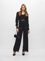 Pull péplum à boucle et pantalon à dentelle
