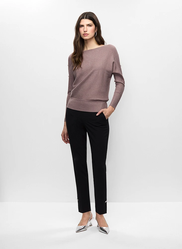 Pull à manches ajourées et pantalon étroit