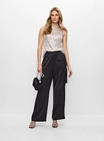 Haut en sequins et pantalon cargo