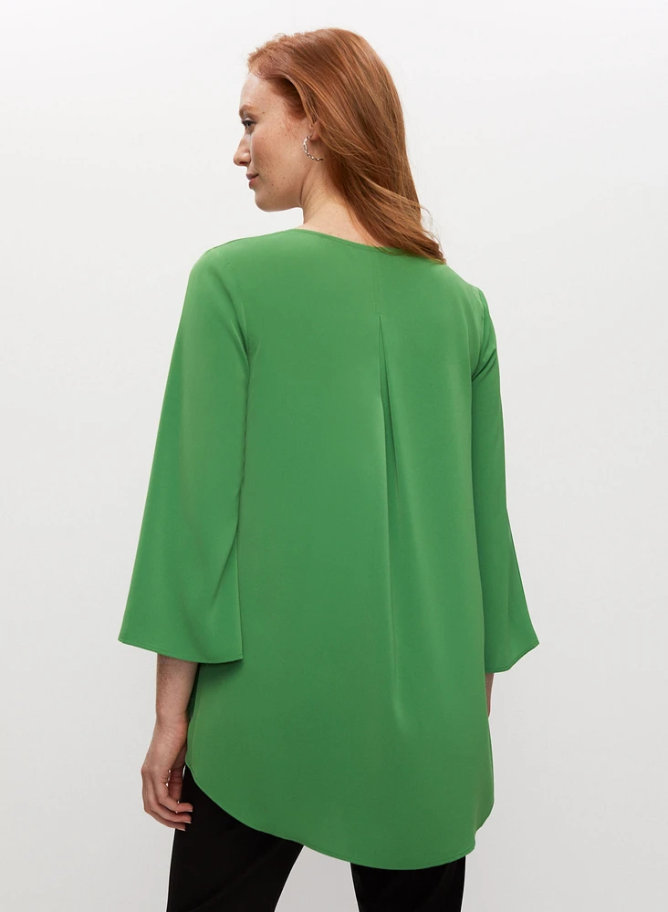 Haut asymétrique à effet superposé