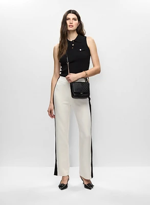 Pull sans manches et pantalon à bandes