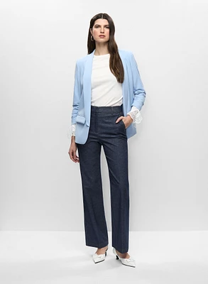 Veste mi-longue et jean évas