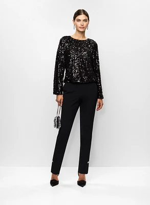 Haut en sequins et pantalon étroit