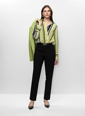 Veste mi-longue et blouse rayée