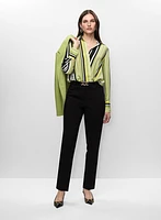 Veste mi-longue et blouse rayée