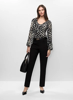 Haut à motif pois et pantalon à jambe étroite