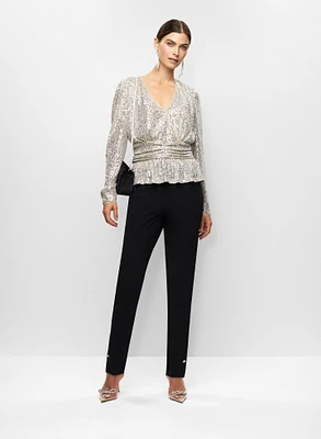 Haut péplum en sequins et pantalon étroit
