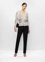 Haut péplum en sequins et pantalon étroit