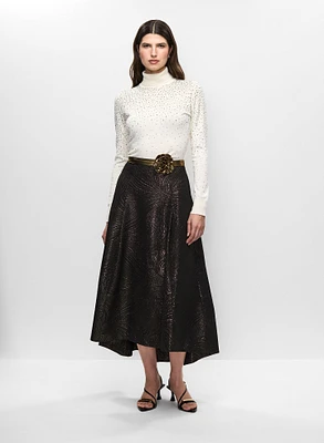 Pull col roulé et jupe asymétrique