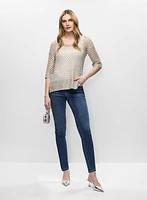Pull en maille ouverte et jean étroit