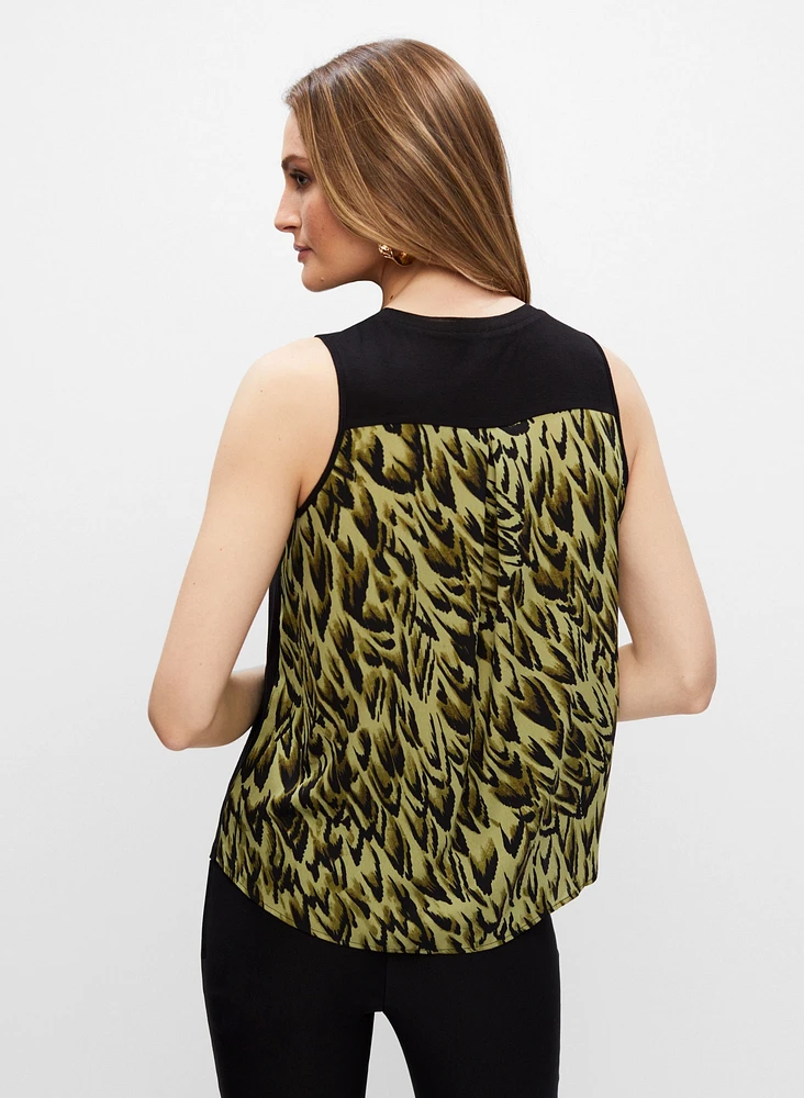 Haut avec poche et dos à motif de plume